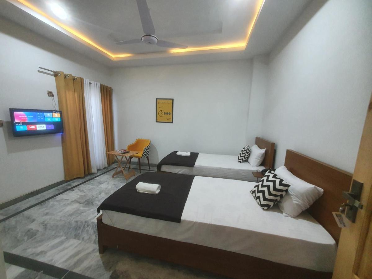 Dastak Hotels Near Airport & Bus Terminal イスラマバード エクステリア 写真